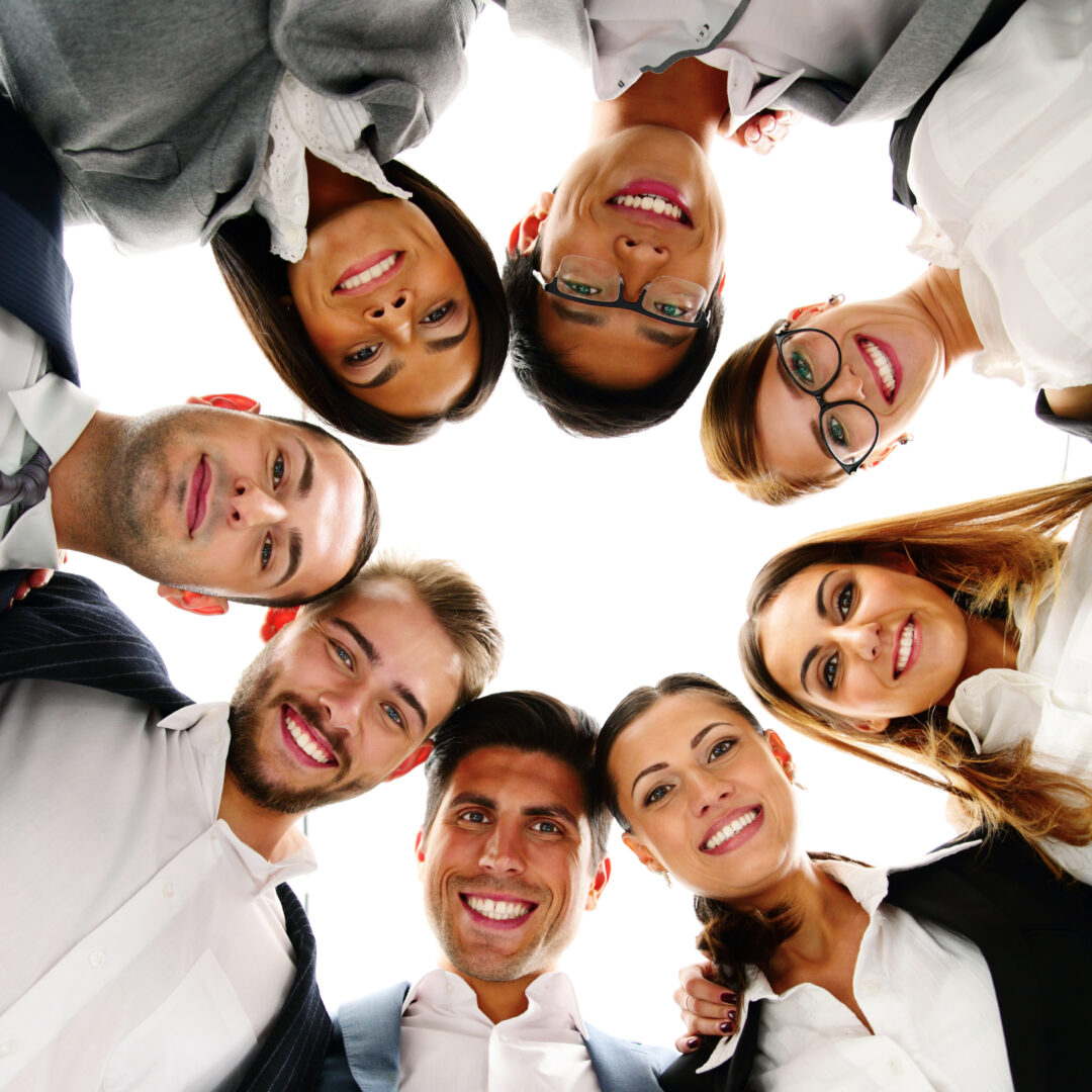 group-of-business-people-in-a-circle-looking-down